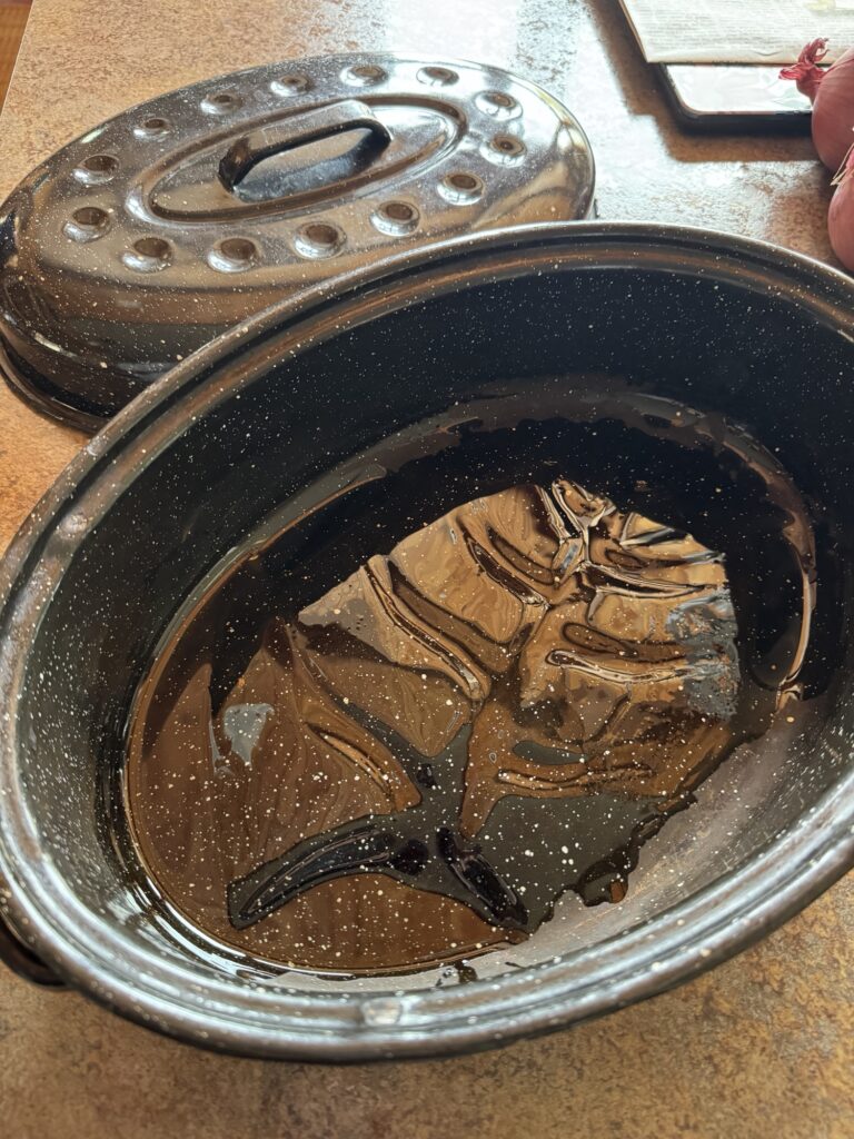 The two halves of a covered roaster