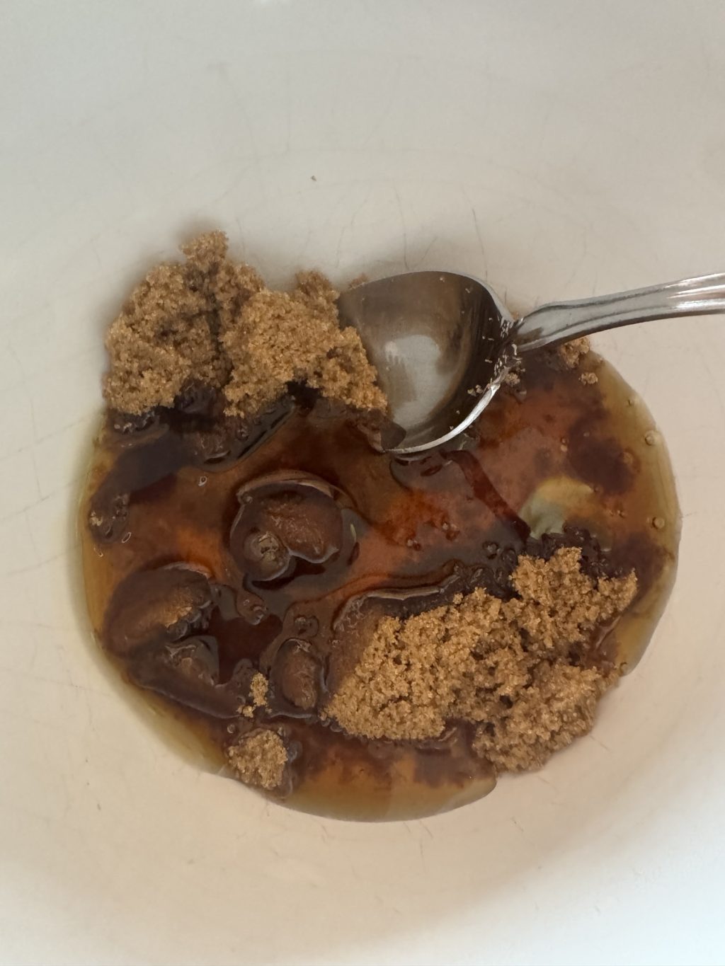 The ingredients for the glaze in a bowl