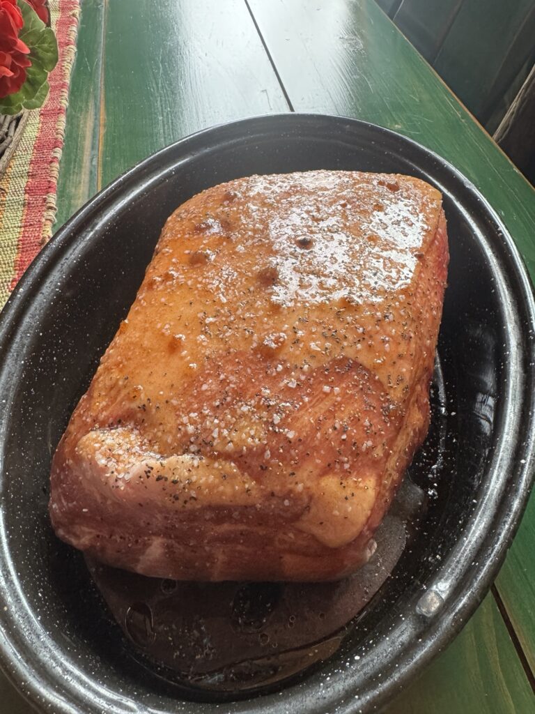 The pork roast in the speckled roaster