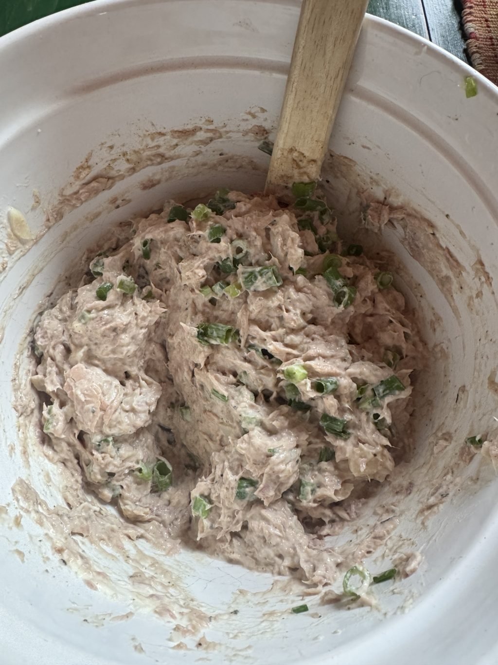 Tuna being mixed in a bowl