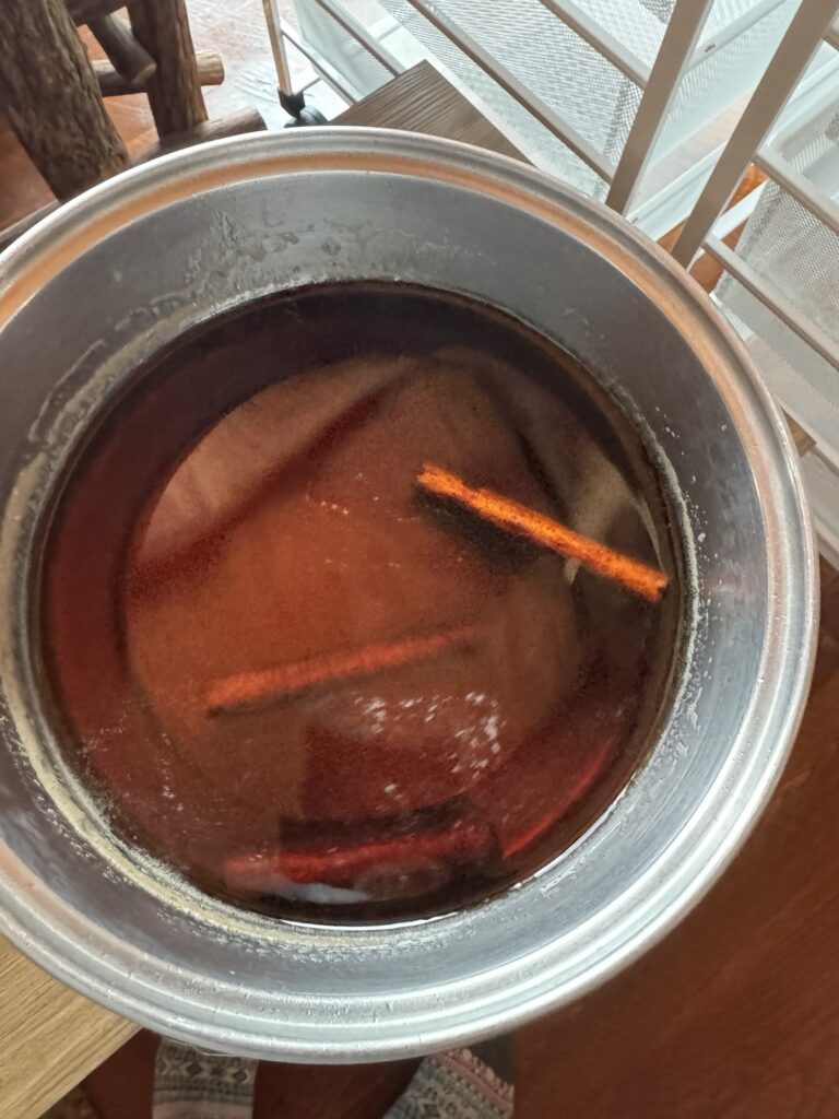 Simple syrup with cinnamon sticks in it