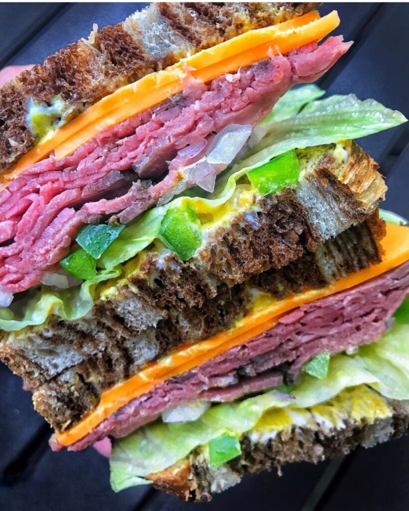 A close up of a roast beef sandwich