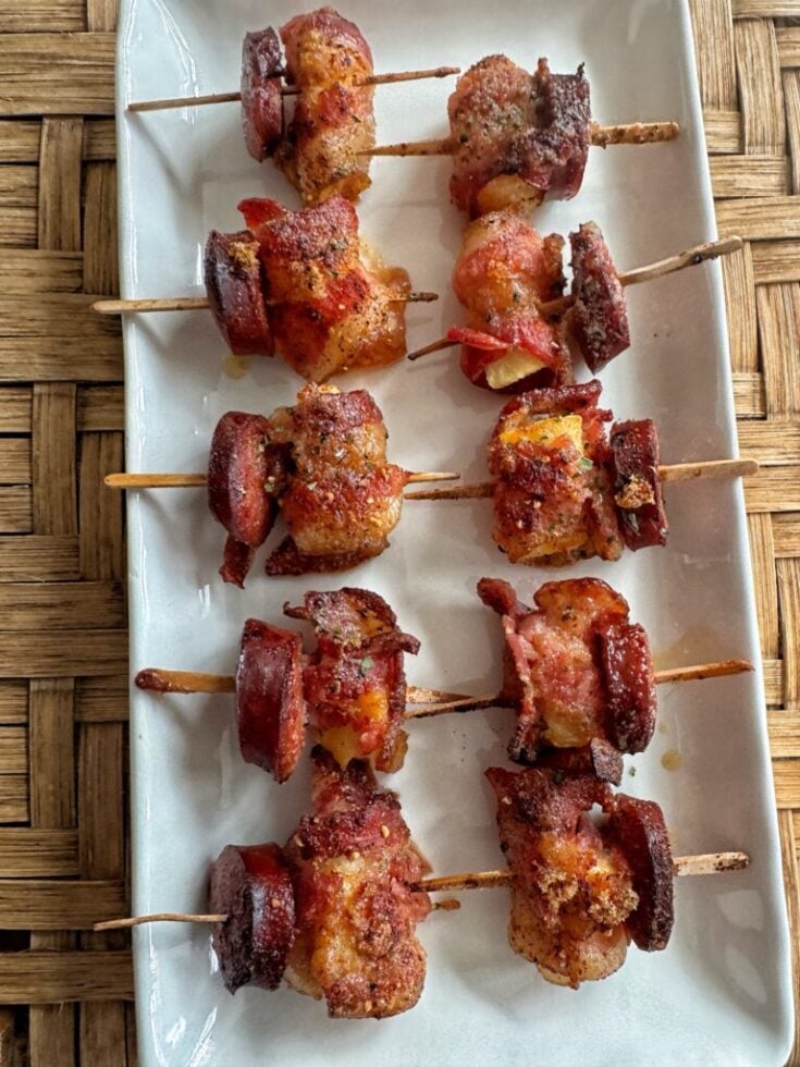 Bacon wrapped pineapple and kielbasa skewers