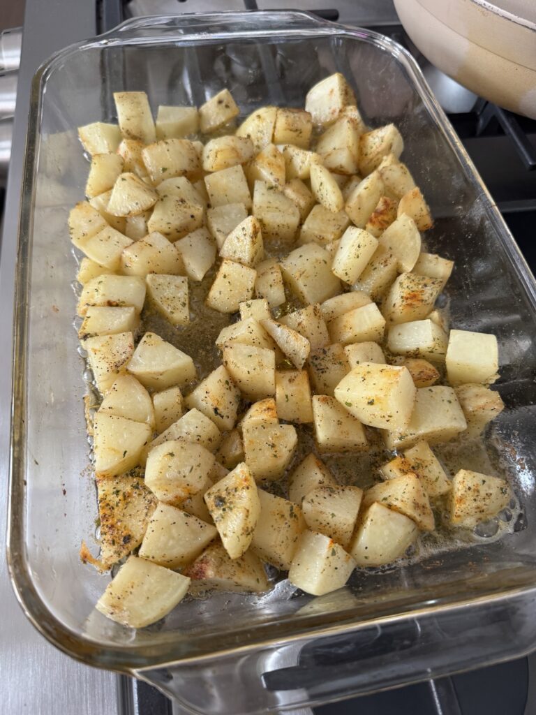 Seasoned potatoes in a baking dish