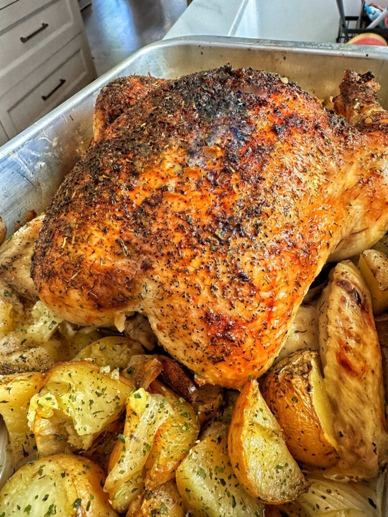 Summer roast chicken over potatoes