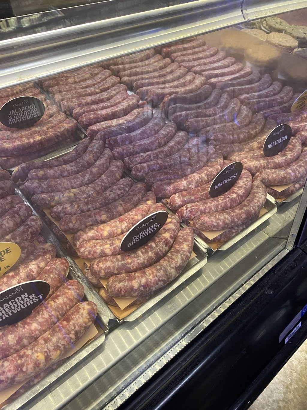 Sausages in a supermarket case