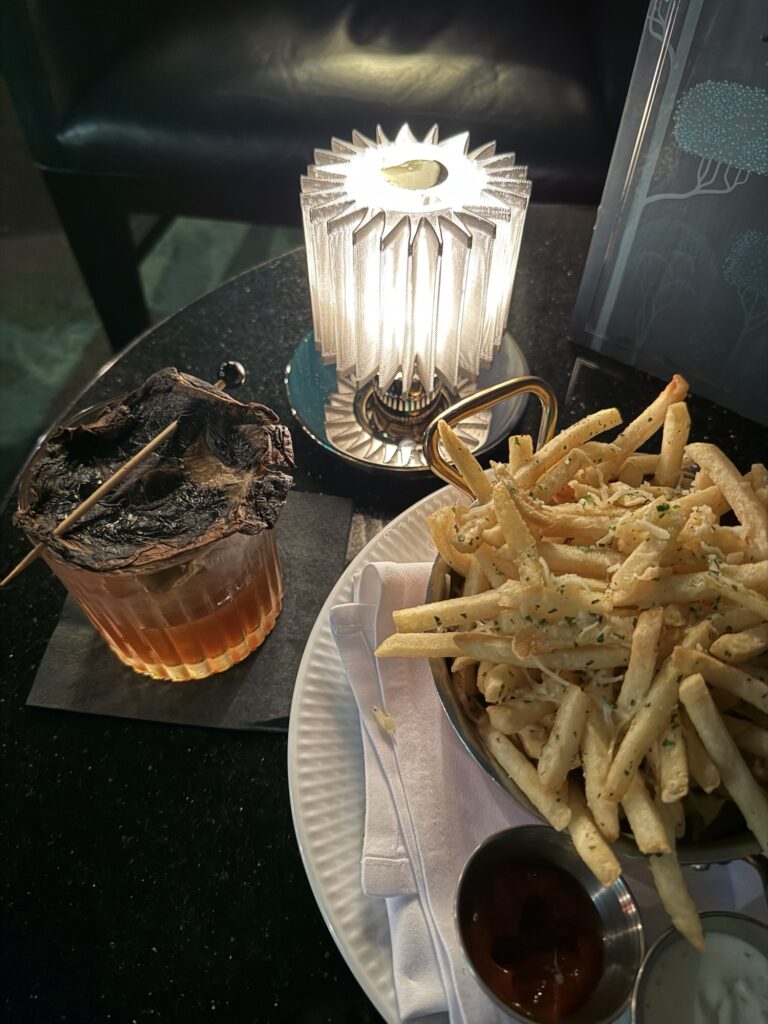 Truffle fries and a cocktail