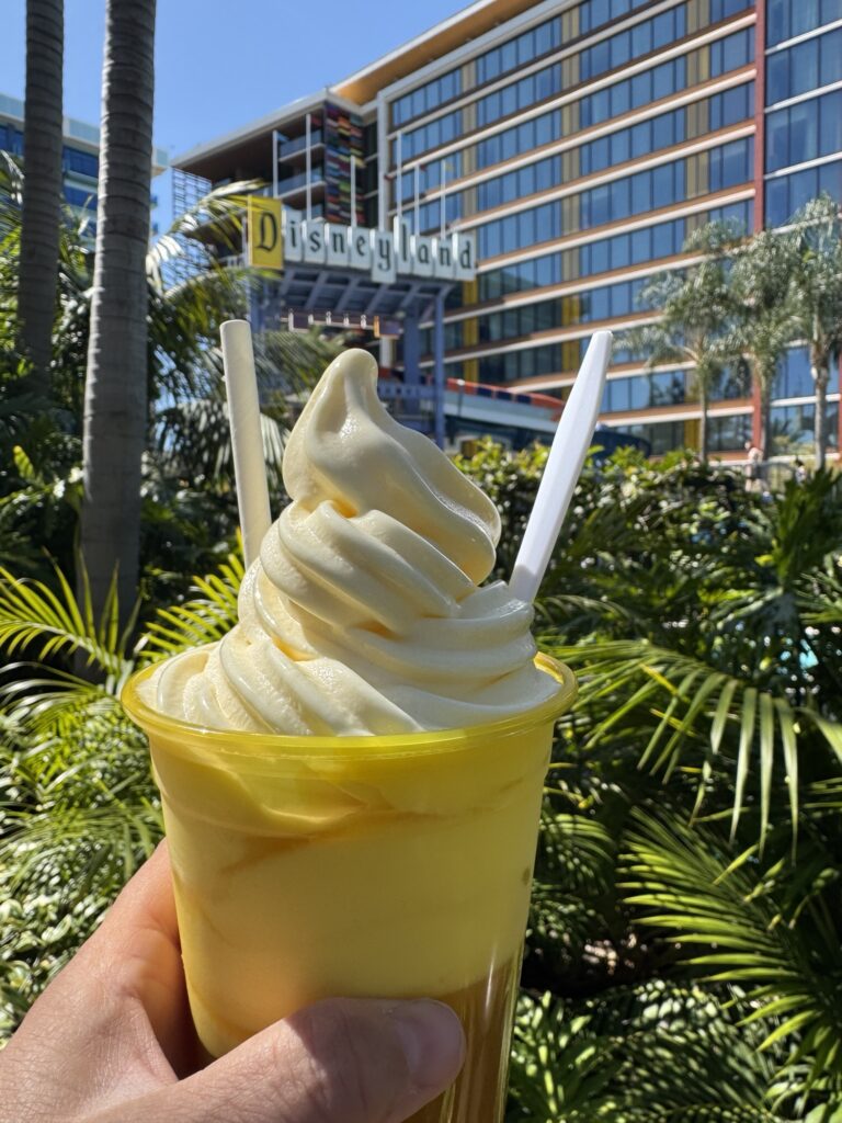 A Dole Whip in front of the Disneyland hotel