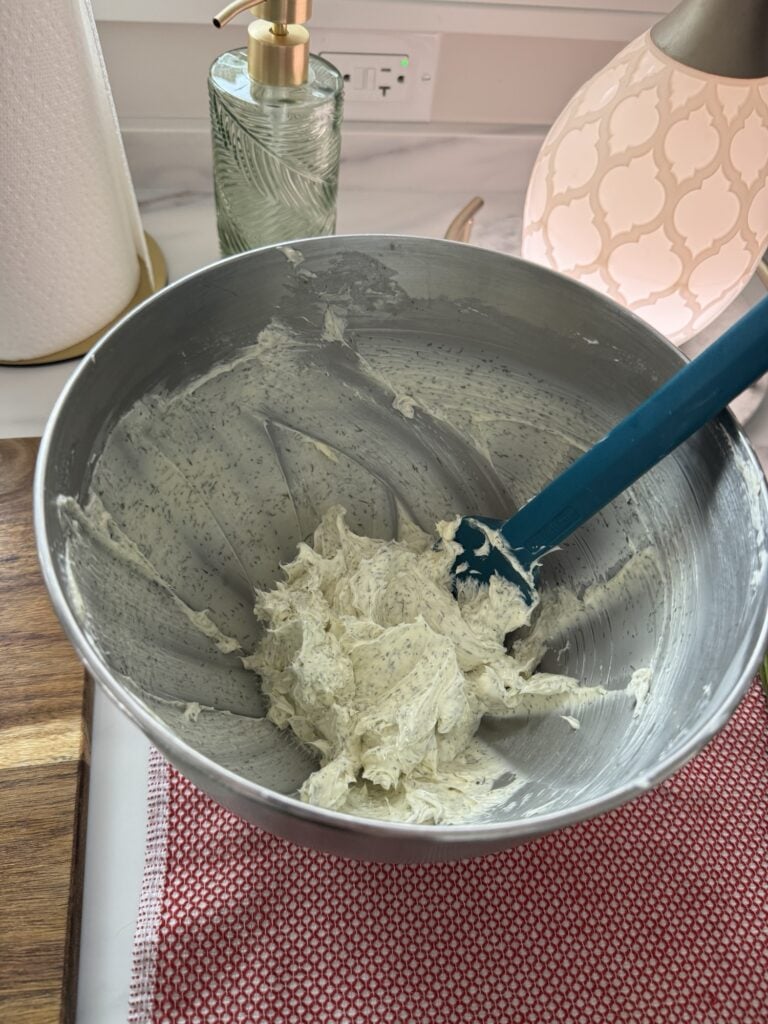 Seasoned butter in a metal bowl
