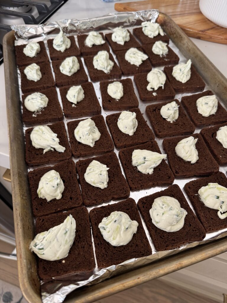 Cream cheese that has been piped on to toasts